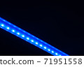Abstract diagonal blue line of lights in dark. 71951558