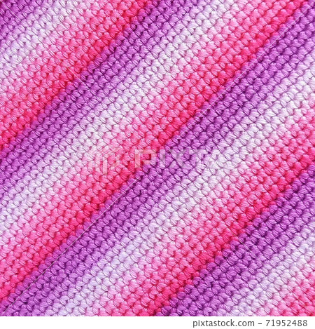 Knitted fabric pink and violet horizontal stripes. Knitted fabric pink and violet horizontal stripes. 71952488
