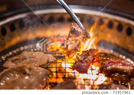 Delicious meat grilled over charcoal Delicious meat grilled over charcoal 71957961