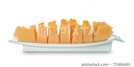 Orange cantaloupe melon fruit sliced on dish isolated on white background ,include clipping path Orange cantaloupe melon fruit sliced on dish isolated on white background ,include clipping path 71966401