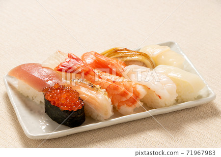 Assorted nigiri sushi and warship winding. Assorted nigiri sushi and warship winding. 71967983