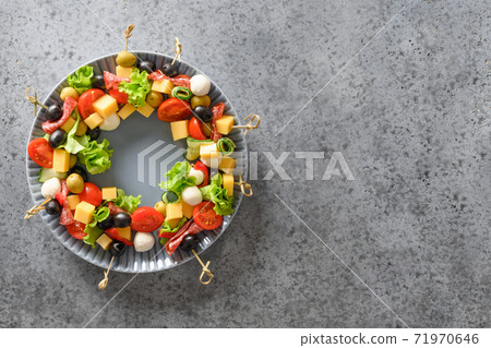Christmas edible wreath of holiday snacks, canapes 71970646