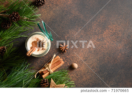 Traditional Christmas eggnog with grated nutmeg Traditional Christmas eggnog with grated nutmeg 71970665