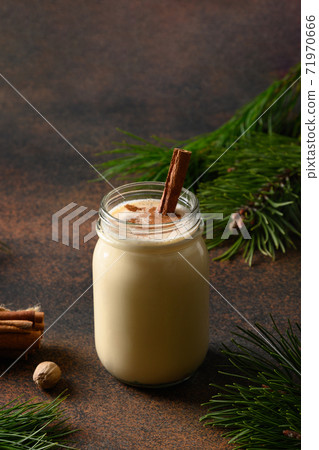 Christmas eggnog in mason jar. Close up. Christmas eggnog in mason jar. Close up. 71970666
