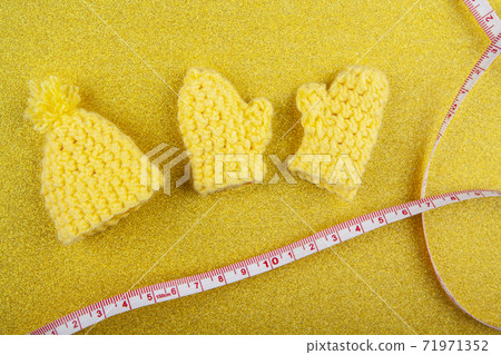 image of wool clothes gold background  71971352