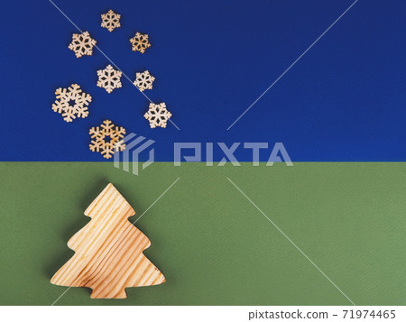 The new year composition of the wooden conifer tree and snowflakes. The new year composition of the wooden conifer tree and snowflakes. 71974465