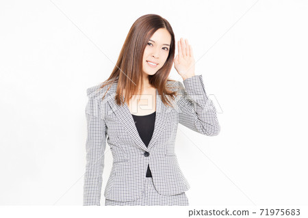 Young business woman listening 71975683