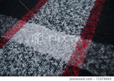 Closeup of red, black and grey woolen scarf texture 71978669