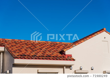 Tile roof and blue sky 71980249