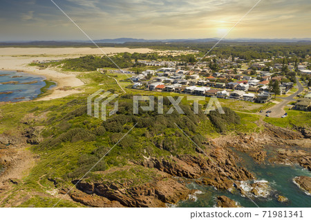The Stockton Sand Dunes and Tasman Sea at Birubi Point in regional Australia The Stockton Sand Dunes and Tasman Sea at Birubi Point in regional Australia 71981341