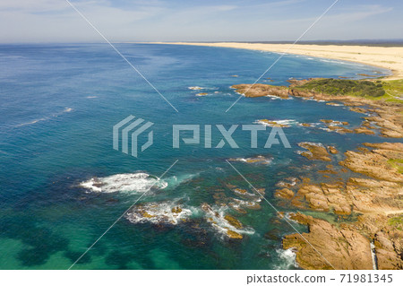 The Stockton Sand Dunes and Tasman Sea at Birubi Point in regional Australia The Stockton Sand Dunes and Tasman Sea at Birubi Point in regional Australia 71981345