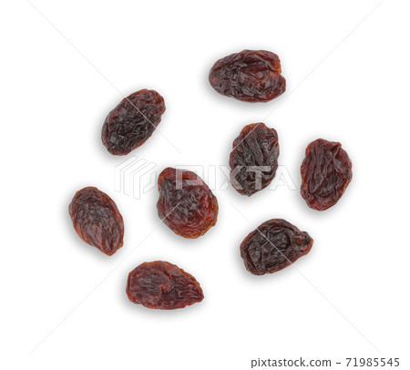 Top view of dried raisins isolated on white background. Top view of dried raisins isolated on white background. 71985545