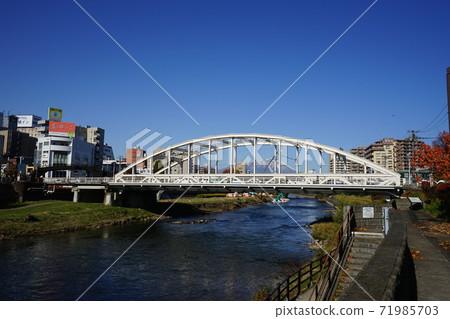 Kaiun Bridge on the Kitakami River that flows through Morioka City Kaiun Bridge on the Kitakami River that flows through Morioka City 71985703