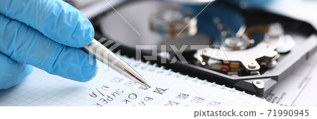 Focused photo on doctor that checking his instrument Focused photo on doctor that checking his instrument 71990945