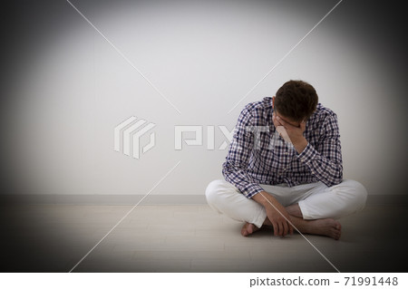 A depressed man 71991448