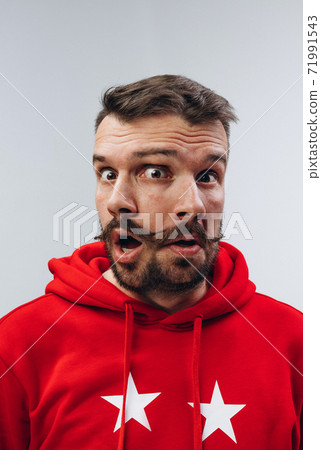 Young man with dual emotions combination on face isolated on white background, emotional and expressive Young man with dual emotions combination on face isolated on white background, emotional and expressive 71991543