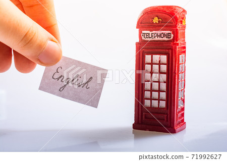 Notepaper with English wording near the telephone booth Notepaper with English wording near the telephone booth 71992627