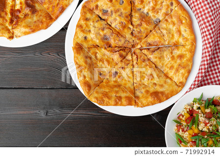 Georgian pie stuffed with lamb meat close up Georgian pie stuffed with lamb meat close up 71992914