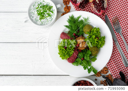 Traditional Georgian dish appetizer Phali served with salad leaves 71993090