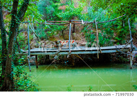 Green habitat at the National Park with lake and river in Kaz Mountain, Kaz Daglari, Mount Ida in the district of Edremit in Balikesir, Turkey Green habitat at the National Park with lake and river in Kaz Mountain, Kaz Daglari, Mount Ida in the district of Edremit in Balikesir, Turkey 71997030
