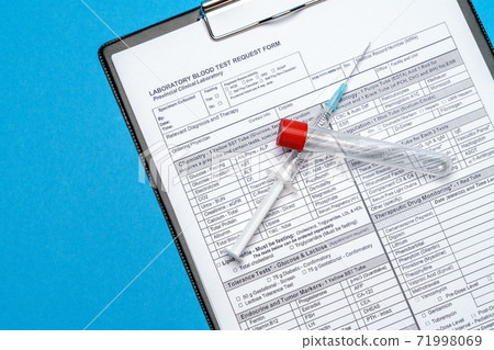 Clipboard with paper blank form with blood test tubes on blue background 71998069