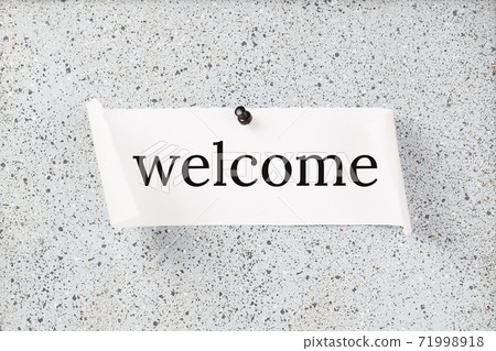 WELCOME Word on notice board on the office desk. Business 71998918