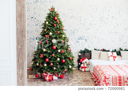 Christmas bedroom interior with bed Christmas tree presents new year as background Christmas bedroom interior with bed Christmas tree presents new year as background 72000981