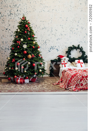 Christmas bedroom interior with bed Christmas tree presents new year as background Christmas bedroom interior with bed Christmas tree presents new year as background 72000982