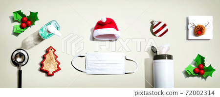 Prevent virus and germs concept with Christmas ornaments Prevent virus and germs concept with Christmas ornaments 72002314