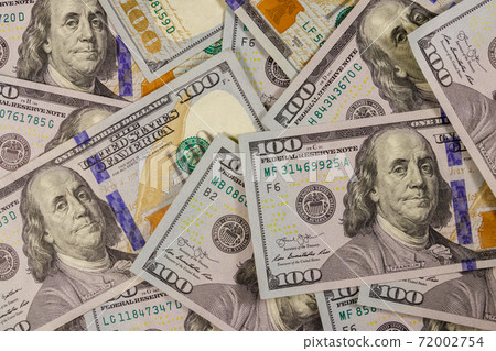 Background of one hundred dollar bills Background of one hundred dollar bills 72002754