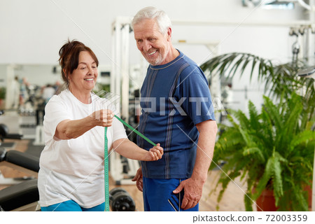 Beautiful elderly couple at sport club. Beautiful elderly couple at sport club. 72003359