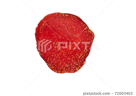 Red paint spot. A spot painted with a brush with flecks of Golden confetti crumbs 72003403