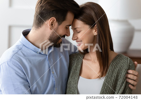 Happy young couple embrace showing love and affection 72004148