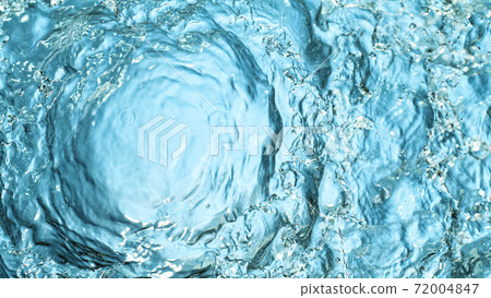 Water splash isolated on blue background 72004847