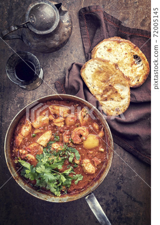 Creole cajun court bouillon with fish and seafood gumbo chowder stew  72005145