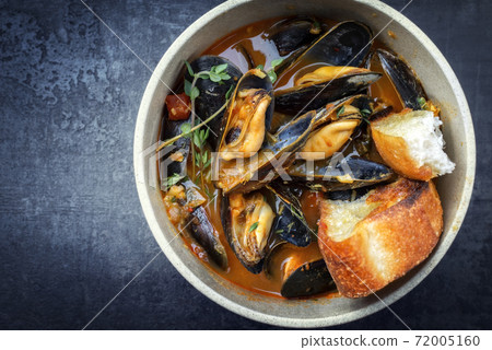 Traditional Louisiana fish jambalaya dish creole cajun with rice and tomatoes 72005160