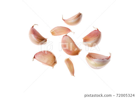 Cloves of garlic isolated on white background Cloves of garlic isolated on white background 72005324