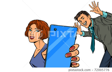 A woman takes a selfie with a man A woman takes a selfie with a man 72005776