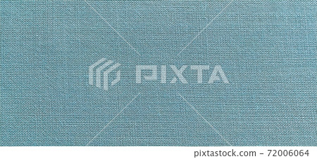 blue-green background of intertwined threads and rows. Banner. Fabric texture with uneven surface 72006064