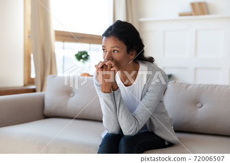 Sad African American woman feel depressed at home Sad African American woman feel depressed at home 72006507