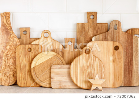 Kitchen utensils on countertop, culinary background, wooden and white ceramic kitchenware, home cooking concept Kitchen utensils on countertop, culinary background, wooden and white ceramic kitchenware, home cooking concept 72007362