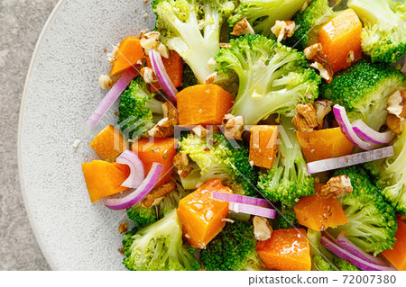 Vegan broccoli salad with baked pumpkin, red onion and walnuts 72007380