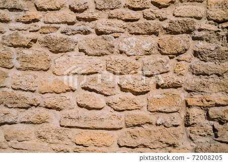 Ancient stonewall close-up view. Abstract background of antique stones of fortes 72008205