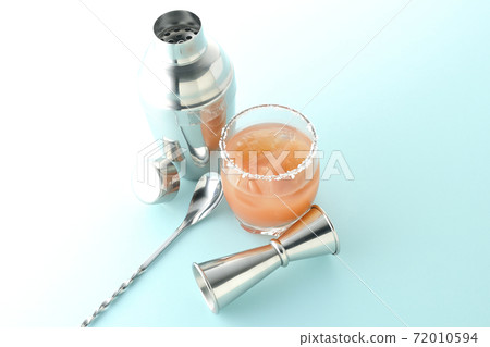 Pink salty dog with salt on the edge of the glass, cocktail shaker and major cup Pink salty dog with salt on the edge of the glass, cocktail shaker and major cup 72010594