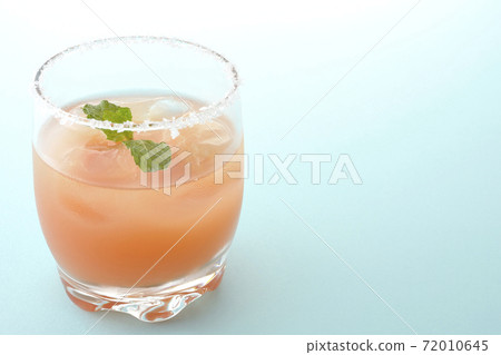 Salty dog with mint with salt on the edge of the glass Salty dog with mint with salt on the edge of the glass 72010645