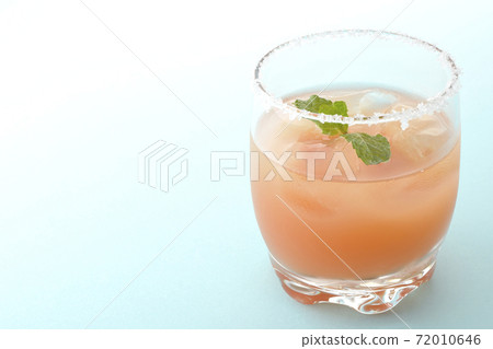 Salty dog with mint with salt on the edge of the glass Salty dog with mint with salt on the edge of the glass 72010646