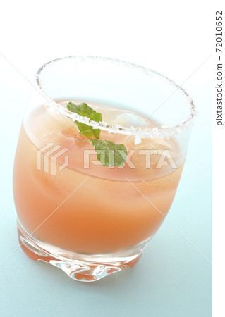 Salty dog with mint with salt on the edge of the glass Salty dog with mint with salt on the edge of the glass 72010652