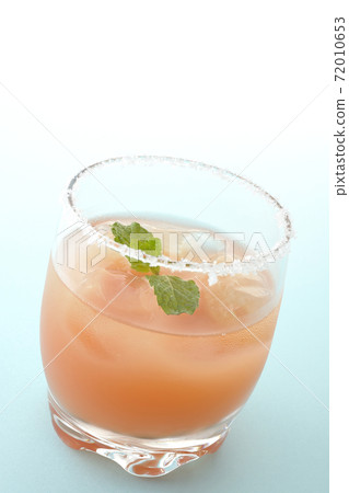 Salty dog with mint with salt on the edge of the glass Salty dog with mint with salt on the edge of the glass 72010653
