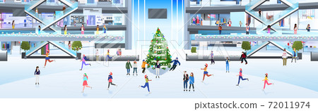 people in masks skating on ice rink men women having fun new year holidays coronavirus quarantine 72011974