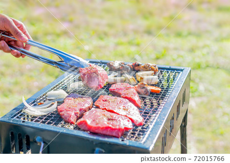 Beef grilled on an outdoor open grill Beef grilled on an outdoor open grill 72015766